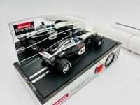 MCLAREN: A 1:24 scale MP4/17 alarm clock by Carrera, together with two McLaren posters [Location: Sydney] - 3