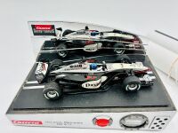 MCLAREN: A 1:24 scale MP4/17 alarm clock by Carrera, together with two McLaren posters [Location: Sydney] - 4