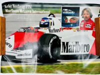 MCLAREN: A 1:24 scale MP4/17 alarm clock by Carrera, together with two McLaren posters [Location: Sydney] - 7