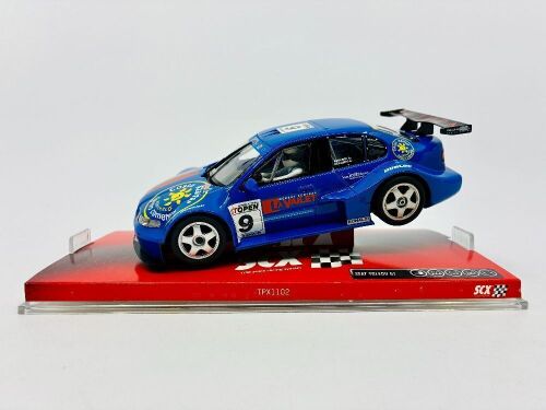SEAT: A 1:32 scale Seat Toledo GT slot car by SCX with original display case [Location: Sydney]