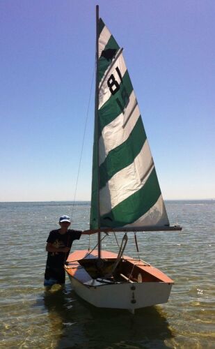 SAIL BOAT: A timber Penguin Class Sail Boat with Dunbier marine trailer, boat complete with sail, oars, and life jackets
