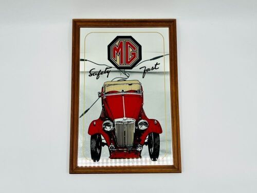 MG: A framed MG TC 'Safety Fast' mirror, 19cm high, 13cm wide [Location: Sydney]
