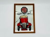 MG: A framed MG TC 'Safety Fast' mirror, 19cm high, 13cm wide [Location: Sydney]