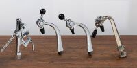 BAR: Three bar counter mounted pourers, with one bracket mounted cork screw