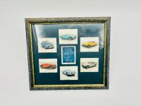 MG: A framed collection of six MG classic car cards, 32cm high, 36cm wide [Location: Sydney]