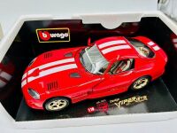 DODGE VIPER: Two Bburago models of the Viper GTS, one in 1:18 scale and the other in 1:24 scale together with a softcover book, 'Enthusiast Colour Series: Viper' by Matthew L. Stone [Location: Sydney] - 2