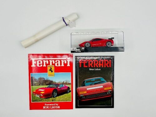 215 · FERRARI: A Ferrari 458 GT2 Kyosho RC car together with two books including 'Ferrari' by Brian Laban and 'Ferrari' by Godfrey Eaton and a Ferrari F1 poster [Location: Sydney]