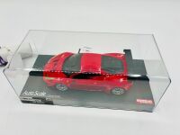 FERRARI: A Ferrari 458 GT2 Kyosho RC car together with two books including 'Ferrari' by Brian Laban and 'Ferrari' by Godfrey Eaton and a Ferrari F1 poster [Location: Sydney] - 5