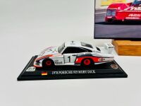 PORSCHE: Two 1:43 scale models including a Porsche 956 by Vitesse and a Porsche 935 together with a a photo of a 956 mounted on board [Location: Sydney] - 2