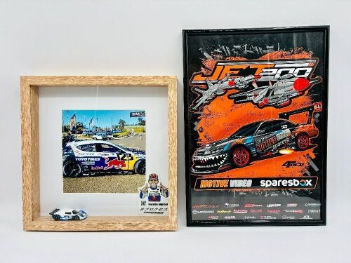 126a · MAD MIKE WHIDDETT: A framed photo of Mad Mike's Mazda 3 and a framed Motive Video poster [Location: Sydney]