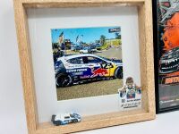 MAD MIKE WHIDDETT: A framed photo of Mad Mike's Mazda 3 and a framed Motive Video poster [Location: Sydney] - 2