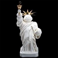 STATUE OF RUBBERTY: A sculpture by renowned Australian Artist Terry Lawrie, inspired by the Statue of Liberty, made from Hydrostone, measures approx 59cm high - This is the last sculpture in Terry Lawrie's Michelin Man series