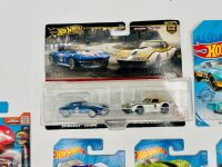 CORVETTE: A hardcover book, 'The Classic Corvette' by Richard Nichols together with a 2 model Hot Wheel set and nine Hot Wheels Corvette 1:68 scale models [Location: Sydney] - 3