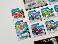 CORVETTE: A hardcover book, 'The Classic Corvette' by Richard Nichols together with a 2 model Hot Wheel set and nine Hot Wheels Corvette 1:68 scale models [Location: Sydney] - 4