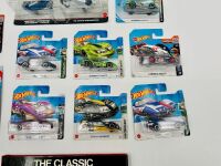 CORVETTE: A hardcover book, 'The Classic Corvette' by Richard Nichols together with a 2 model Hot Wheel set and nine Hot Wheels Corvette 1:68 scale models [Location: Sydney] - 5