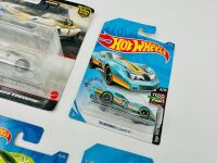 CORVETTE: A hardcover book, 'The Classic Corvette' by Richard Nichols together with a 2 model Hot Wheel set and nine Hot Wheels Corvette 1:68 scale models [Location: Sydney] - 6