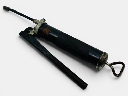 398 · GREASE GUN: A vintage grease gun branded Telstar