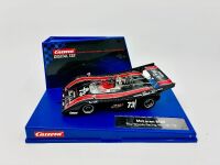 MCLAREN: A 1:32 scale slot car by Carrera of the McLaren M20 with original display case [Location: Sydney]