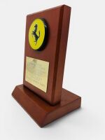 FERRARI: A trophy mounted on a wooden plinth inscribed 'Australian Ferrari Register Autumn Supersprint 15 March 1992 Class 5 328/348 Runner-Up', 18cm high x 13cm wide