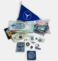 STICKERS & PATCHES: A collection of stickers and patches from various historic events