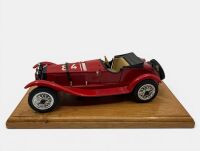 ALFA ROMEO: A 1:18 scale model of the 6C 2300 by Polistil mounted on a wooden plinth