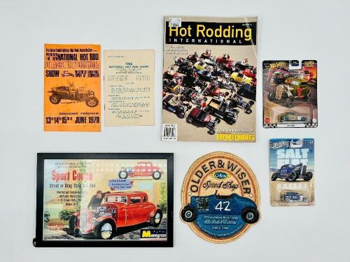 247 · HOT RODS: Two National Hot Rod Show programmes together with a framed poster, an 'Older & Wiser Speed Shop' decorative plaque, two Hot Wheels models and Issue 13 of Hot Rodding International [Location: Sydney]