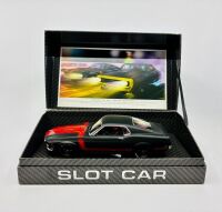 FORD MUSTANG: A 1:24 scale Ford Mustang Boss 302 'Black Edition' slot car by BRm with original packaging [Location: Sydney]