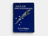 JAGUAR: UNDER THE SOUTHERN CROSS: A hardcover book by Les Hughes, signed by author.