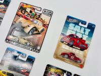 MUSCLE CARS: Nine 1:64 scale Hot Wheels models together with an issue of 'Classic American' magazine and a photo of an AC Cobra [Location: Sydney] - 2