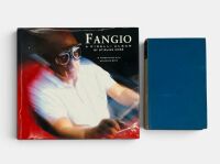 JUAN MANUEL FANGIO: A pair of hardcover books including "A Pirelli Album" by Stirling Moss signed by Fangio.