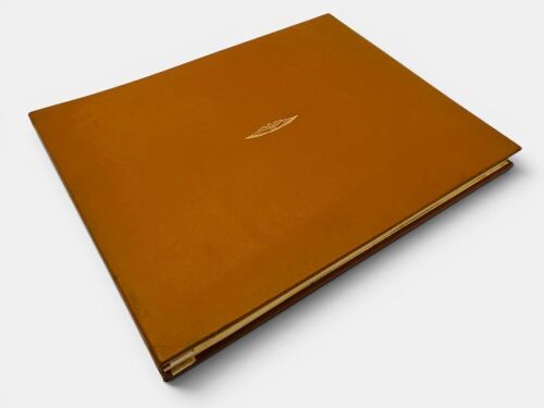 660 · THE GREAT AMERICAN CLASSICS: A leather bound hardcover porfolio of 24 prints by artist Ken Dallison, numbered 1413/2000.
