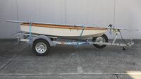 SAIL BOAT: A timber Penguin Class Sail Boat with Dunbier marine trailer, boat complete with sail, oars, and life jackets - 2