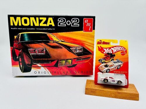 260 · CHEVROLET MONZA: A 1:25 scale Chevrolet Monza model kit by AMT with a 1:64 scale Hot Wheels model [Location: Sydney]