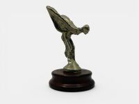 ROLLS-ROYCE: A 'Flying Lady' mascot mounted on a timber base