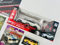 FORD MUSTANG: A group of Mustang items including a 1:26 scale GT350R by Gear Maxx, a 1:43 scale GT Convertible, a 1:68 scale Cobra II Racer and an issue of Classic American Magazine [Location: Sydney] - 2