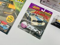FORD MUSTANG: A group of Mustang items including a 1:26 scale GT350R by Gear Maxx, a 1:43 scale GT Convertible, a 1:68 scale Cobra II Racer and an issue of Classic American Magazine [Location: Sydney] - 4