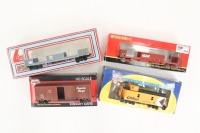 COUPLERS & CABOOSE: Four HO scale models