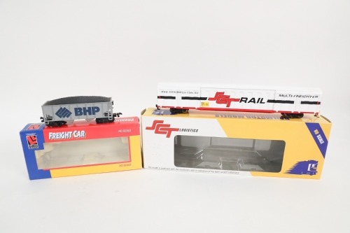 185 · FREIGHT: Two HO scale model freight wagons, including SCT Logistics Broken Stripe w/Kadees and BHP Hopper Wagon