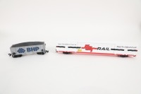 FREIGHT: Two HO scale model freight wagons, including SCT Logistics Broken Stripe w/Kadees and BHP Hopper Wagon - 2