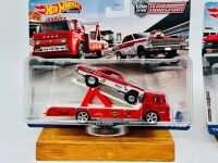 HOT WHEELS: Two 1:64 scale Hot Wheels Premium Team Transport sets with original packaging [Location: Sydney] - 2
