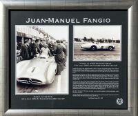 JUAN MANUEL FANGIO: A Limited Edition framed print of Juan Manuel Fangio in the W194 Streamliner winning the 1954 British Grand Prix at Silverstone, numbered 24/100, 78cm x 68cm