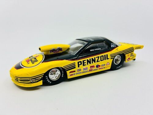 PONTIAC: A 1:24 scale model by Racing Champions of Mike Thomas's Pennzoil Route 66 Pontiac Firebird Pro Stock Car [Location: Sydney]