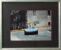 PORSCHE: A framed colour photograph of the 906 hillclimb special 906-008 raced by Gerhard Mitter/Colin Davis at the Targa Florio in 1965, 58cm x 48cm