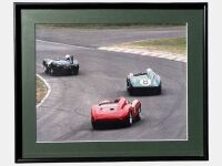 ASTON MARTIN: A group of four framed colour photographs showing the ex-works DB3/S 'DB3S/9' formerly owned by Kerry Manolas at various historic races, various sizes - 2