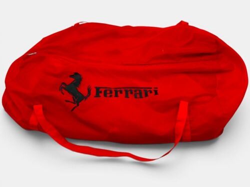 85 · FERRARI: A pair of Andrea seat covers with Ferrari Prancing Horse logos