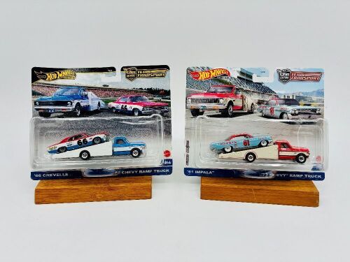 299 · HOT WHEELS: Two Hot Wheels 'Team Transport' sets including a 1972 Chevy Ramp Truck with a 1966 Chevelle and a 1972 Chevy Ramp Truck with a 1961 Impala [Location: Sydney]