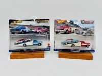 HOT WHEELS: Two Hot Wheels 'Team Transport' sets including a 1972 Chevy Ramp Truck with a 1966 Chevelle and a 1972 Chevy Ramp Truck with a 1961 Impala [Location: Sydney]
