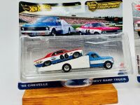 HOT WHEELS: Two Hot Wheels 'Team Transport' sets including a 1972 Chevy Ramp Truck with a 1966 Chevelle and a 1972 Chevy Ramp Truck with a 1961 Impala [Location: Sydney] - 2