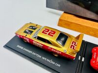 DODGE DAYTONA: Two 1:43 scale models of the Dodge Daytona by Universal Hobbies, together with a hardcover book 'Supercars: The Story of the Dodge Charger Daytona and Plymouth Superbird' by Frank Moriarty [Location: Sydney] - 3
