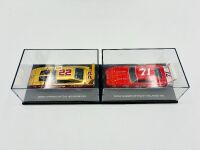 DODGE DAYTONA: Two 1:43 scale models of the Dodge Daytona by Universal Hobbies, together with a hardcover book 'Supercars: The Story of the Dodge Charger Daytona and Plymouth Superbird' by Frank Moriarty [Location: Sydney] - 8